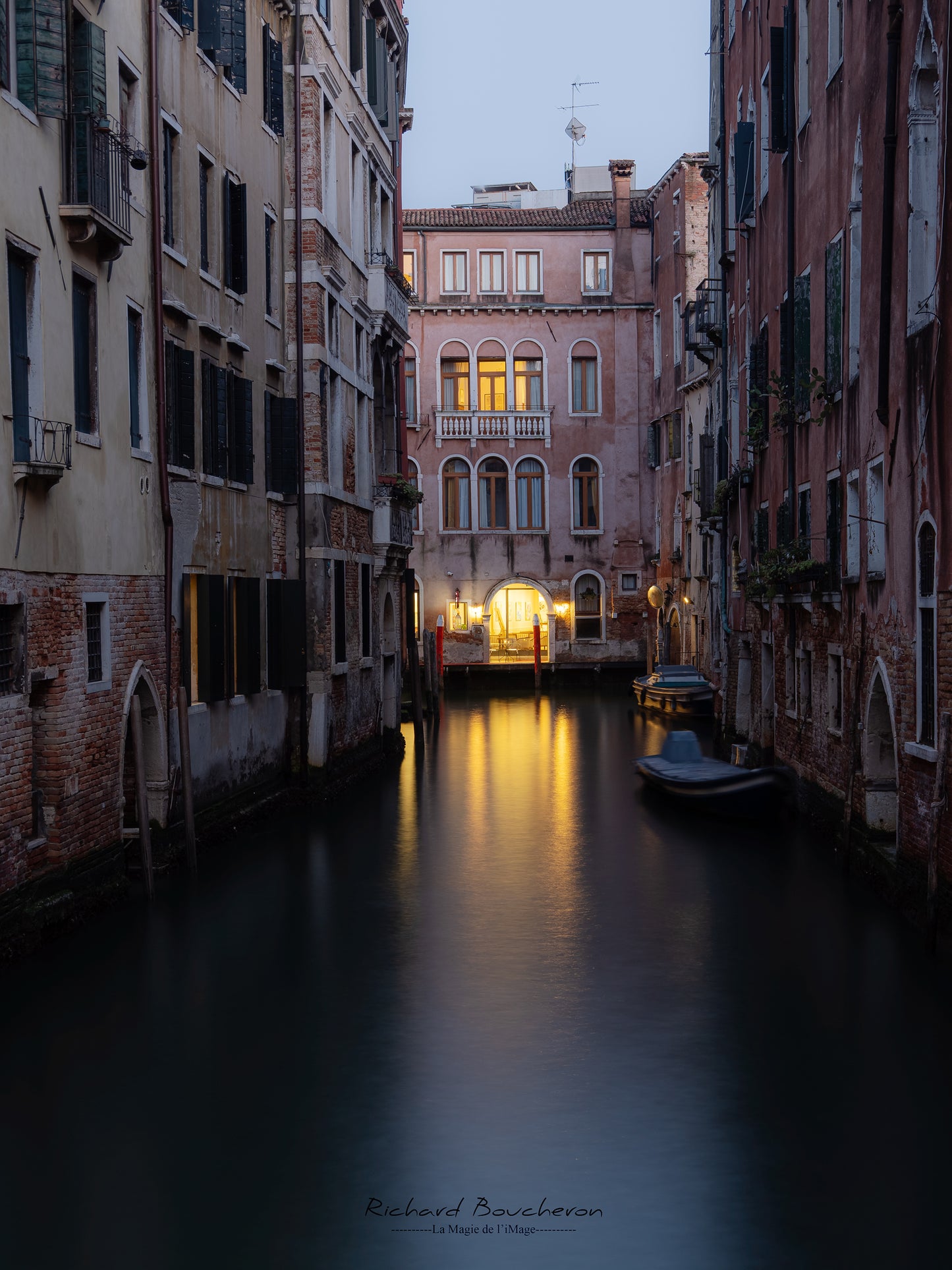 Venice at Dusk: Illuminated Canal and Romantic Atmosphere