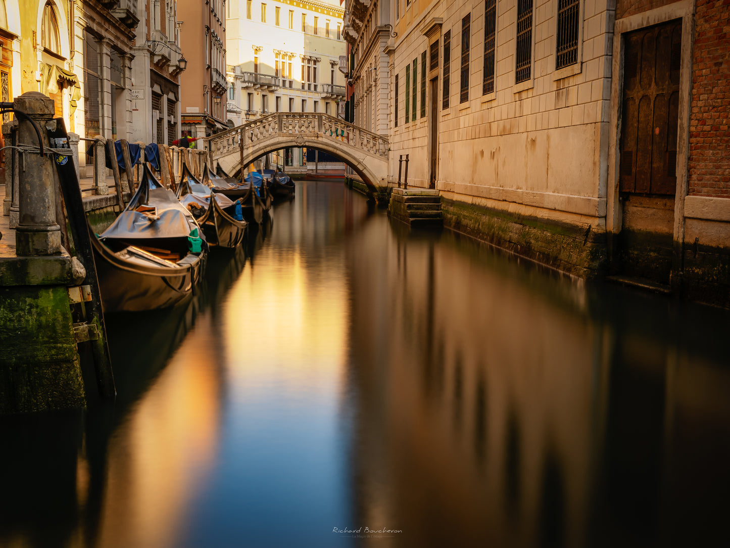 Venice at dawn - Stone bridge and gondolas